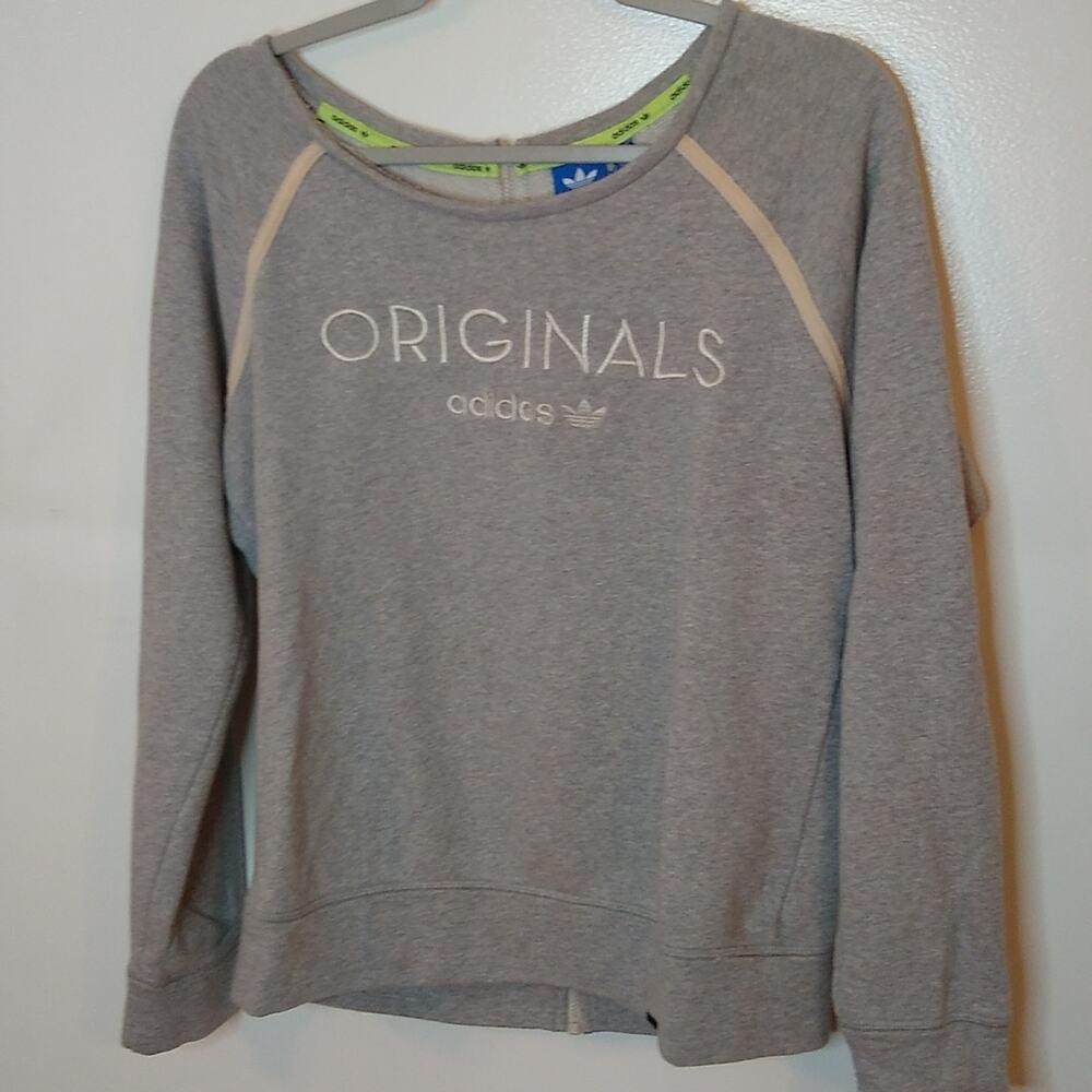 Original Adidas Women's size medium sweatshirt. Comfy and Cozy